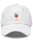 Embroidered Aperol Spritz cocktail design on orange and white dad hat
